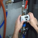 Compteur d'énergie thermique (CET) individuel connecté avec affichage digital, utilisé pour mesurer les consommations de chauffage et optimiser la performance énergétique des logements - OCEA Smart Building